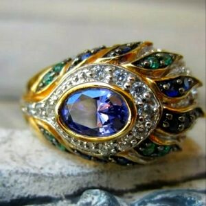 Victoria Wieck  Tanzanite and Topaz Peacock Feather Ring